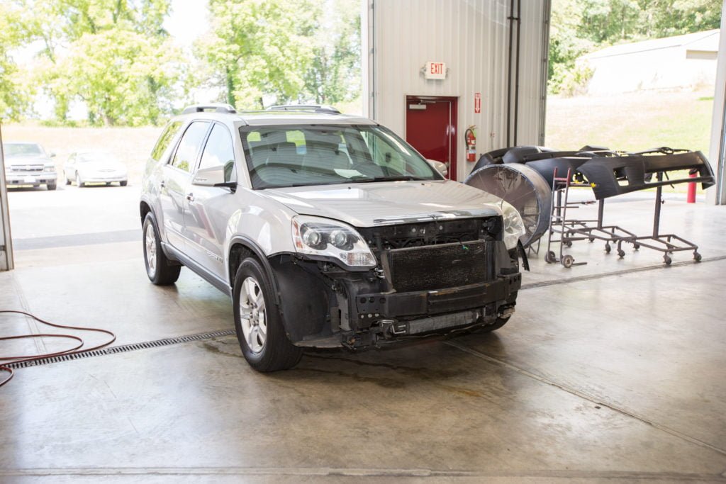 Missing front bumper auto damage