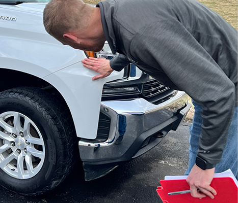 Estimator conducting a complete repair estimate at Martin's Body Shop